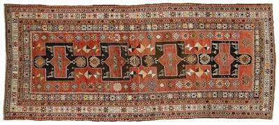 Appraisal: Caucasian rug four central medallions with quadrupeds faded burgundy ground