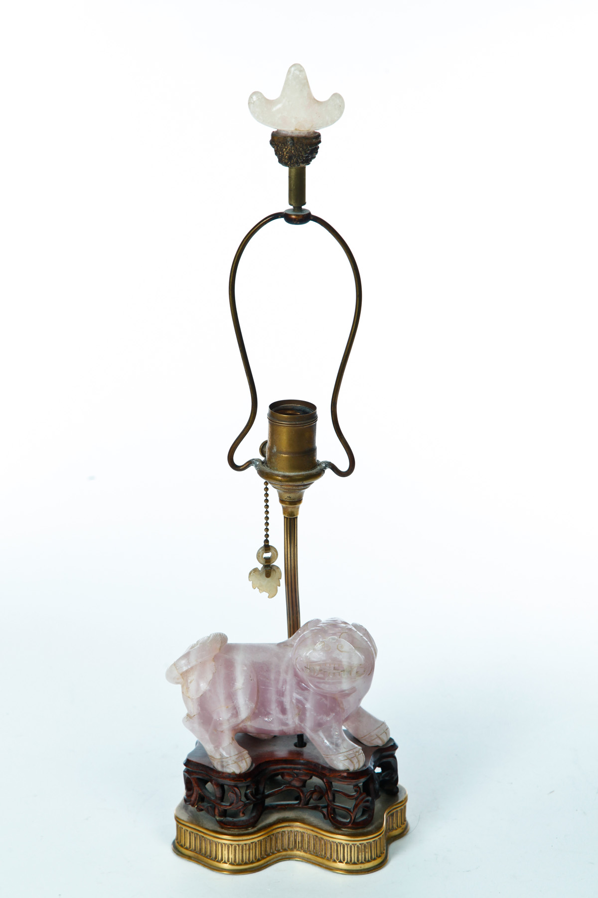 Appraisal: CHINESE ROSE QUARTZ LAMP Twentieth century Carved foo dog on