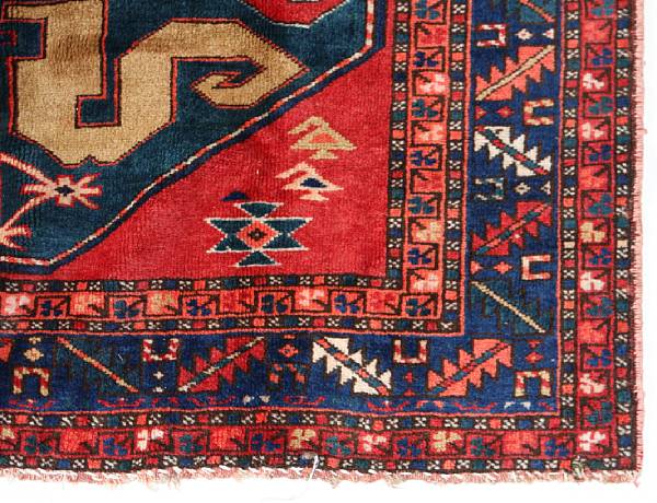 Appraisal: A Kazak rug size approximately ft in x ft in