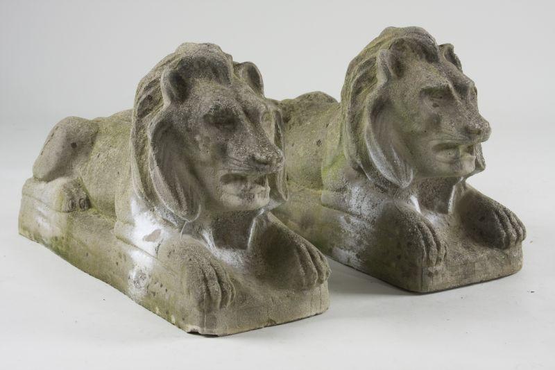 Appraisal: Pair of Cast Stone Architectural Lions th c recumbent form