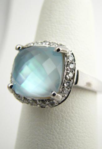 Appraisal: K White gold ring with fancy-cut blue topaz having mother