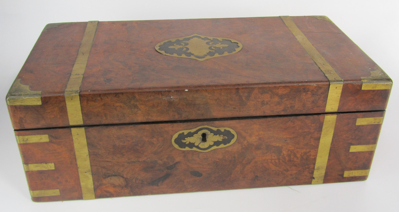 Appraisal: A Victorian walnut and brass bound and inlaid writing slope