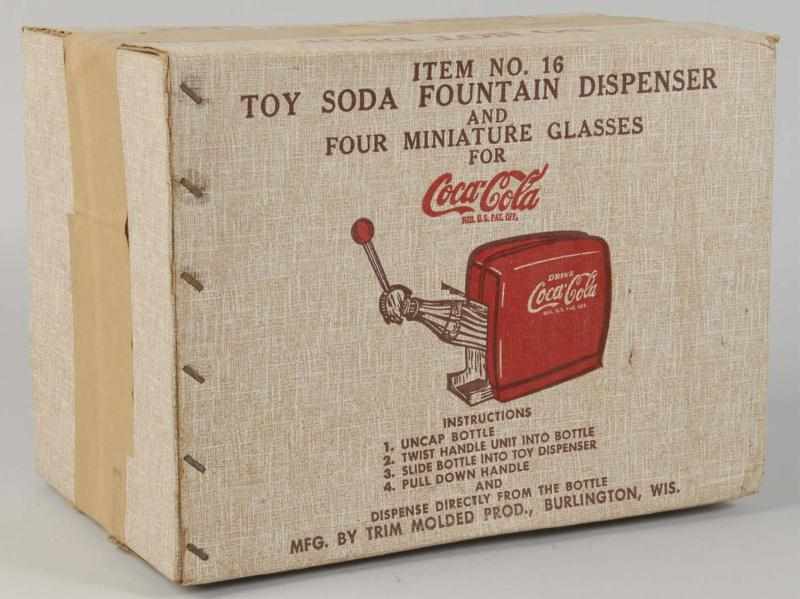 Appraisal: Coca-Cola Toy Dispenser Description s Complete with original box that