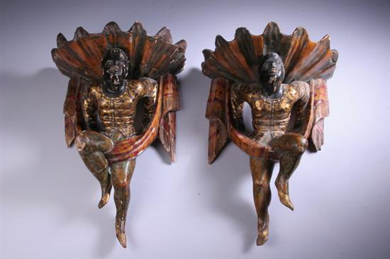 Appraisal: PAIR ITALIAN CARVED AND PAINTED BLACKAMOOR BRACKETS early th century