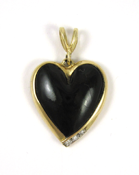 Appraisal: BLACK CORAL AND DIAMOND PENDANT k yellow gold set with