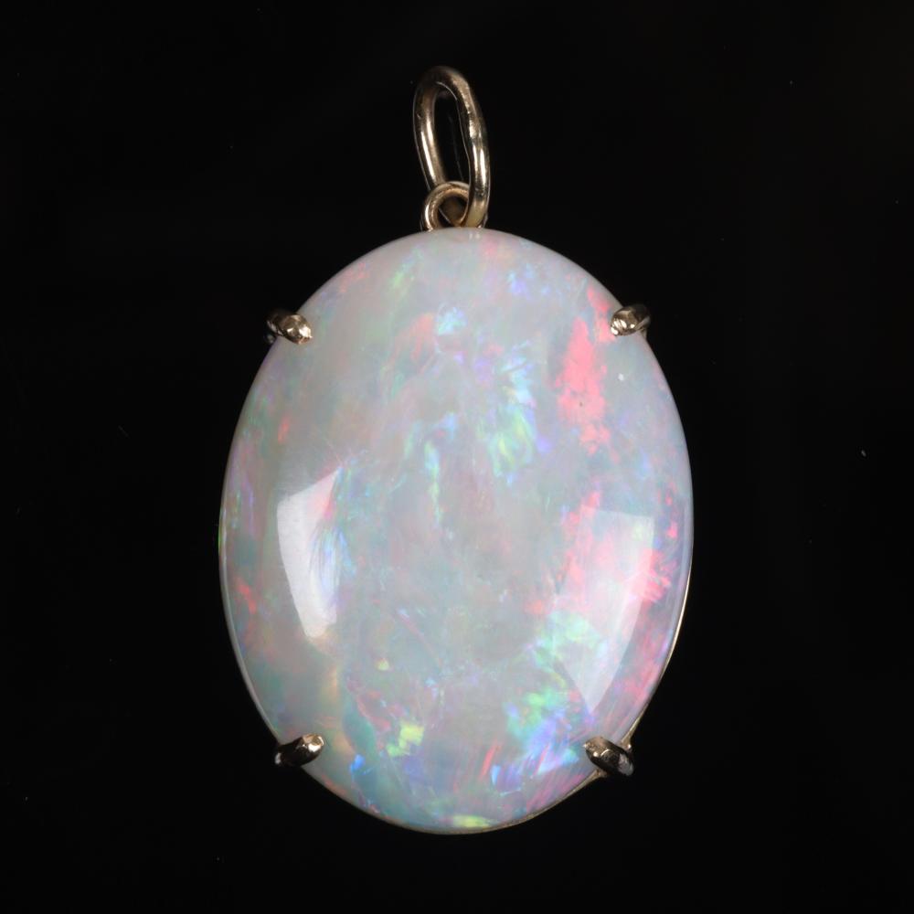 Appraisal: Oval Cabochon ct White Opal in K yellow gold pendant