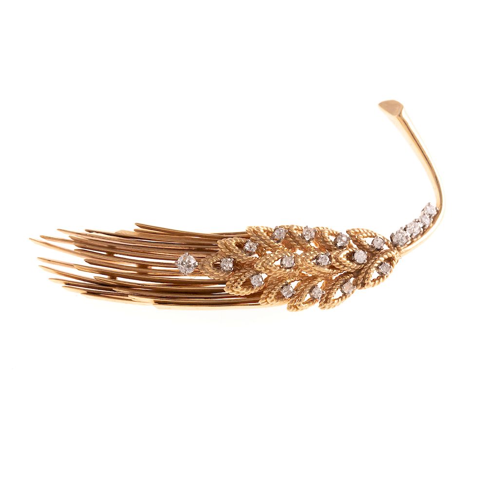 Appraisal: A Textured Diamond Feather Brooch in K K yellow gold