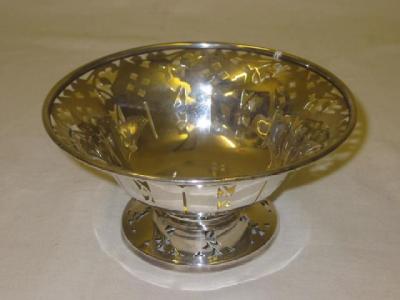 Appraisal: A BONBON DISH of circular form with moulded rim pierced