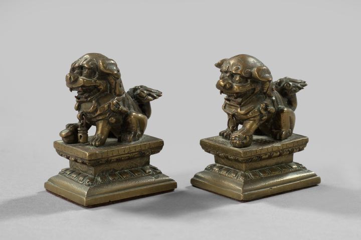 Appraisal: Pair of Kuang Hsu Patinated Bronze Figures of Foo Dogs