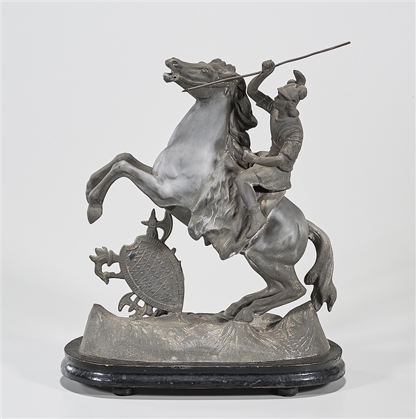 Appraisal: Metal sculpture of a man with spear riding a rearing