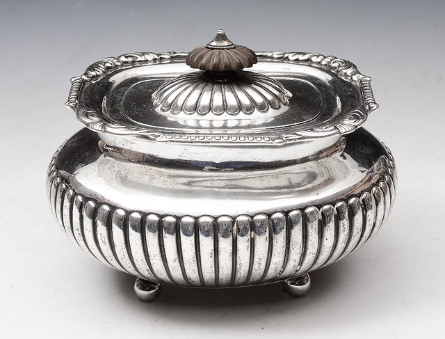 Appraisal: A LATE VICTORIAN SILVER TEA CADDY oval shaped with wrythen