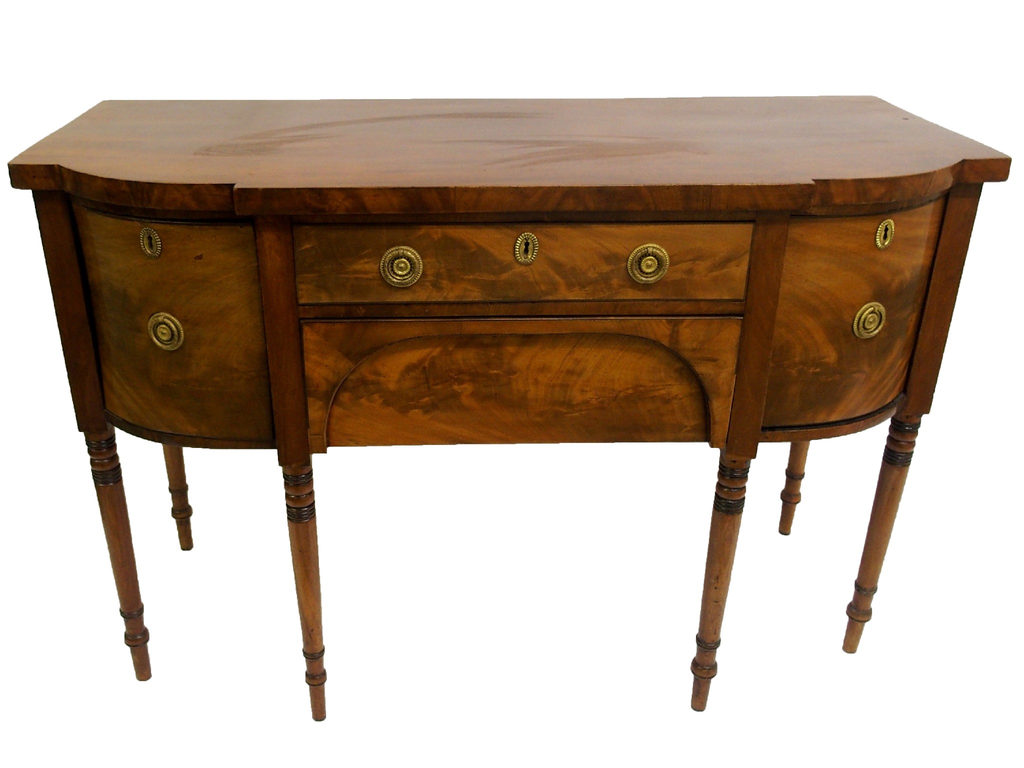 Appraisal: A George IV mahogany breakfront sideboardwith central drawer above deep