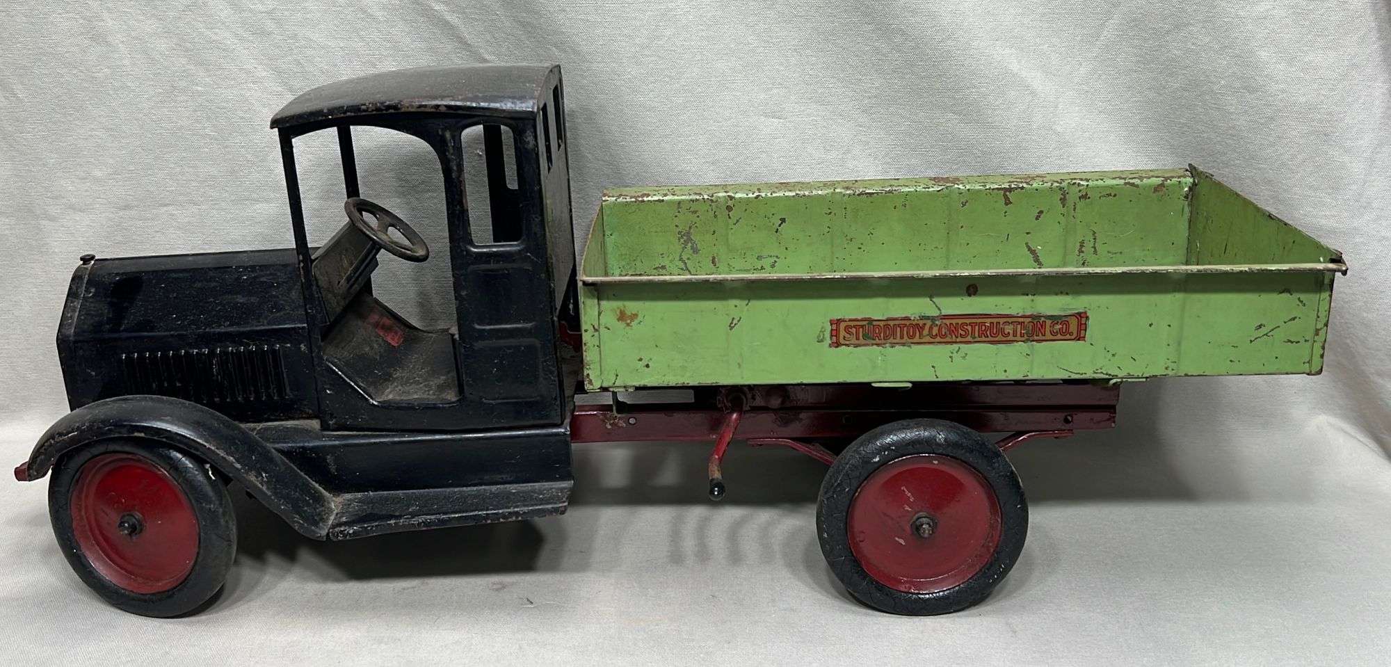 Appraisal: Sturditoy Construction Co pressed steel dump truck toyearly th century