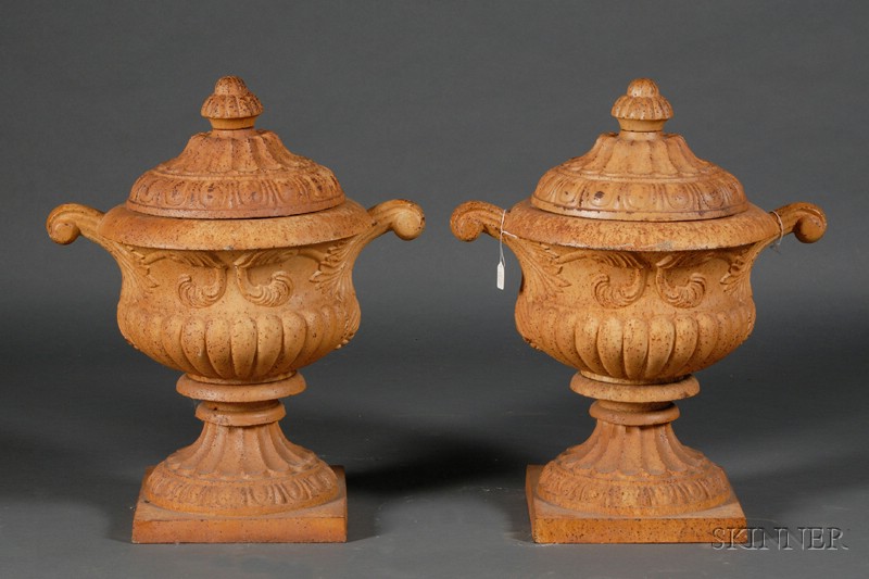 Appraisal: Pair of Painted Cast Iron Covered Garden Urns late th