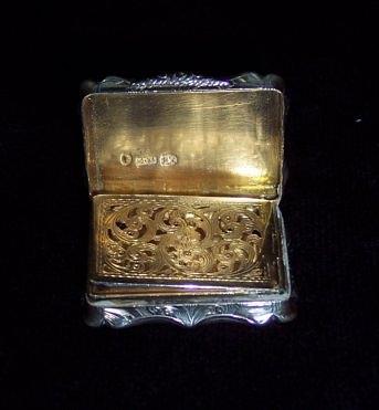 Appraisal: A vinaigrette by Nathaniel Mills the shaped rectangular box engraved