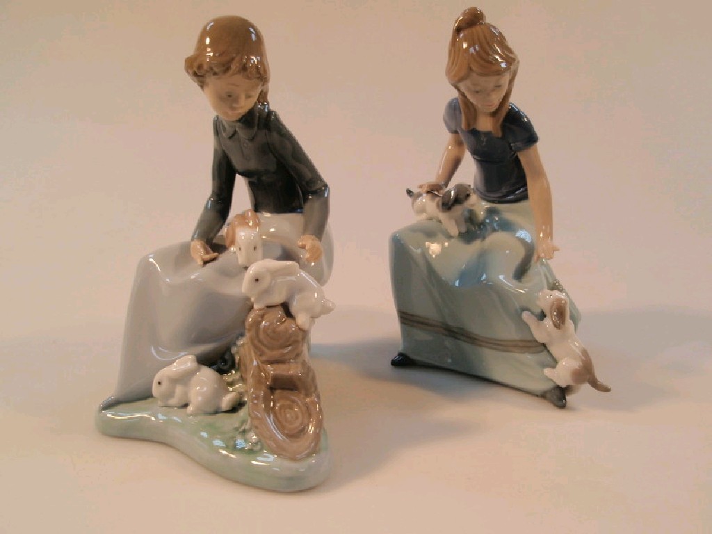 Appraisal: A pair of Nao figures one with rabbits and one