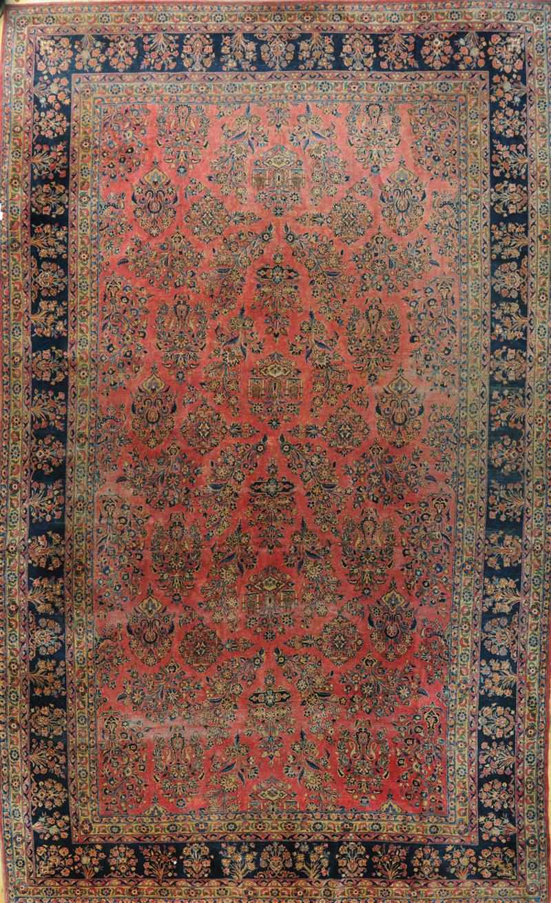 Appraisal: SAROUK CARPET The wine red field worked with floral clusters