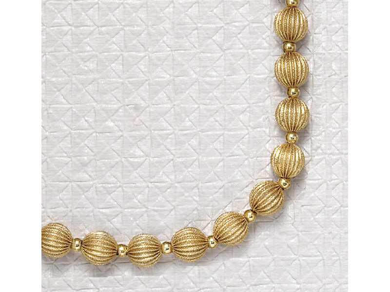 Appraisal: GOLD BEAD NECKLACE k fluted and polished beads Length inches