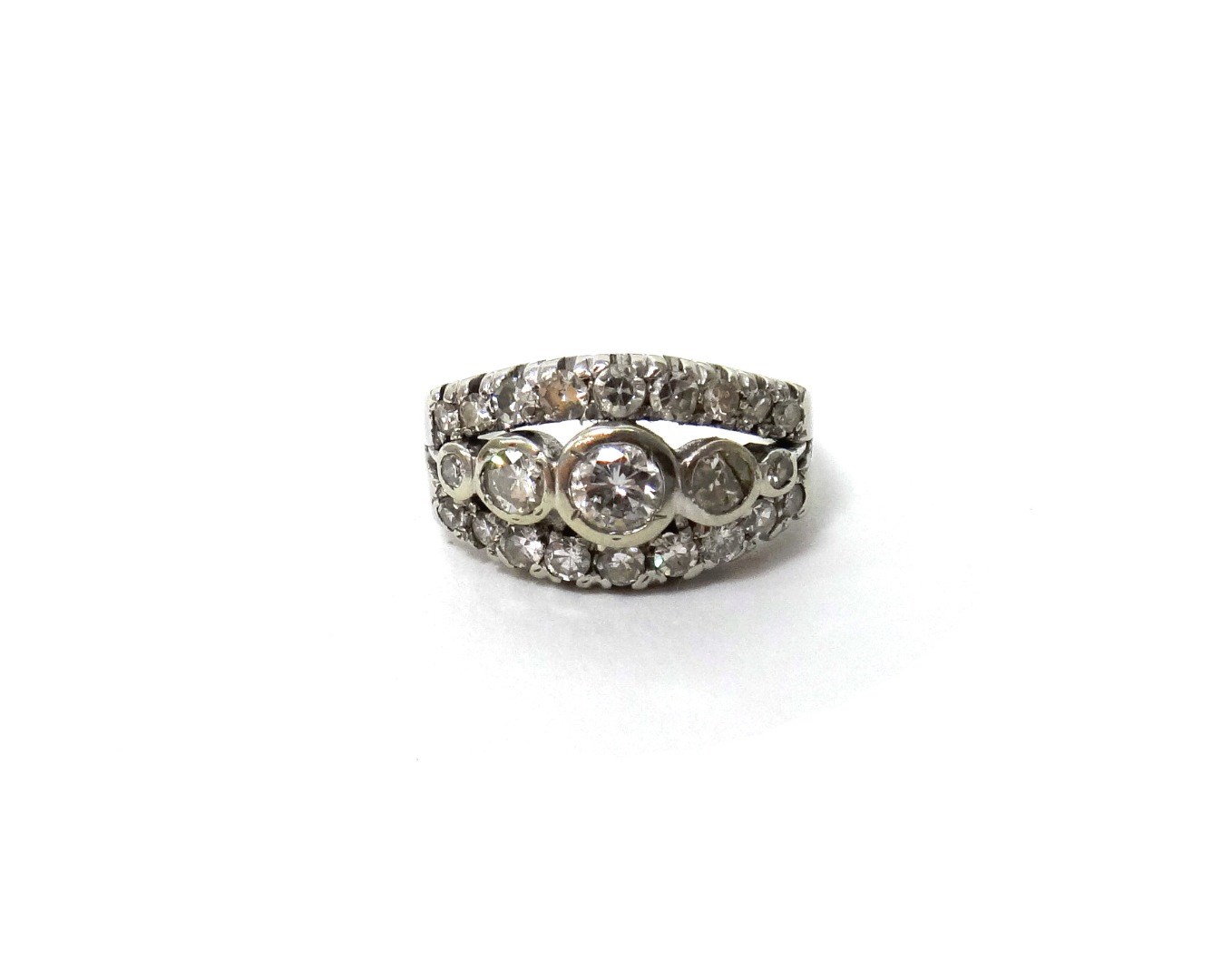 Appraisal: A diamond set ring mounted with a row of five