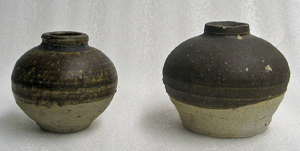 Appraisal: Two small Southeast Asian glazed trade ware jarlets Each of