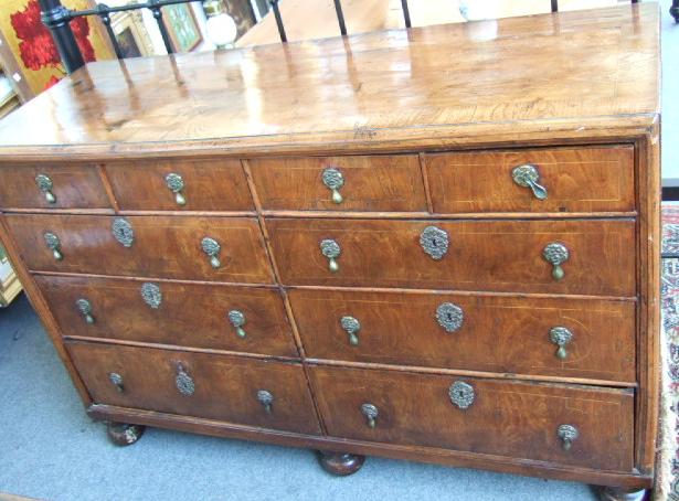 Appraisal: A William Mary double chest the crossbanded rectangular elm top