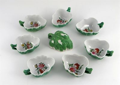 Appraisal: A set of eight small Doccia leaf moulded dishes with