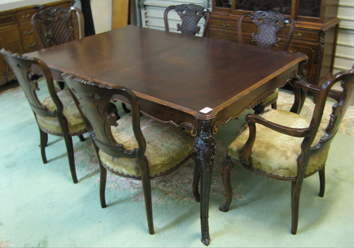 Appraisal: LOUIS XV STYLE MAHOGANY DINING TABLE AND CHAIR SET American