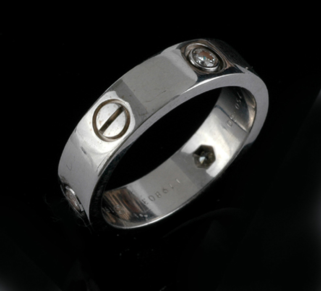 Appraisal: A Love ring by Cartier The gents ct white gold