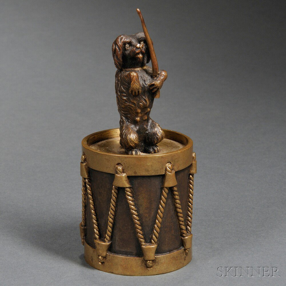 Appraisal: Figural Bronze Bell th century modeled as a dog holding