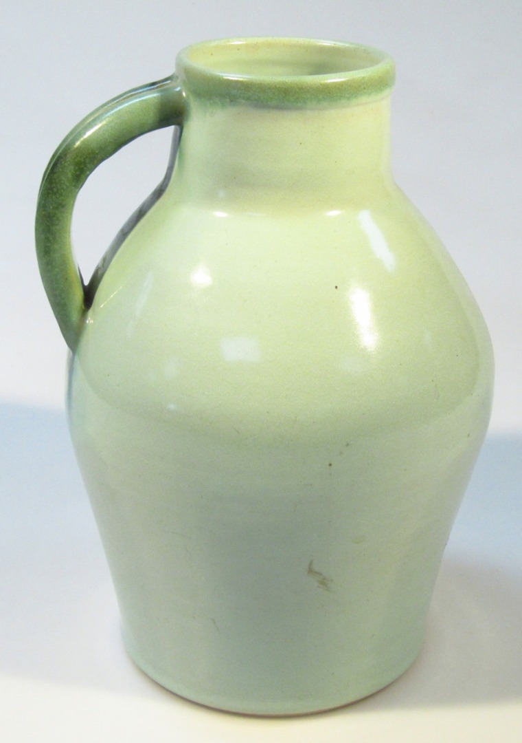 Appraisal: A Bourne Denby Studio pottery flagon of bellied circular outline