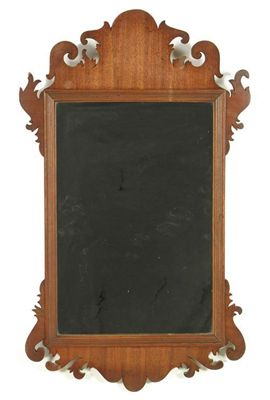 Appraisal: A mahogany fret frame wall mirror x in x cm