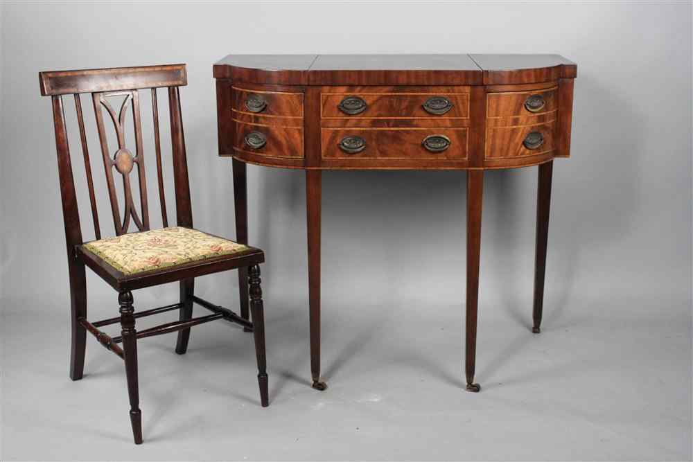 Appraisal: FEDERAL STYLE MAHOGANY VANITY TABLE with shaped top the central