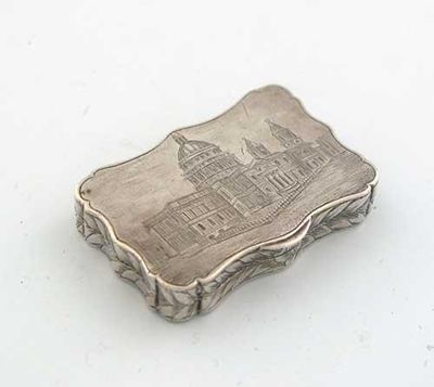 Appraisal: A Victorian engraved 'castletop' vinaigrette shaped oblong with a view