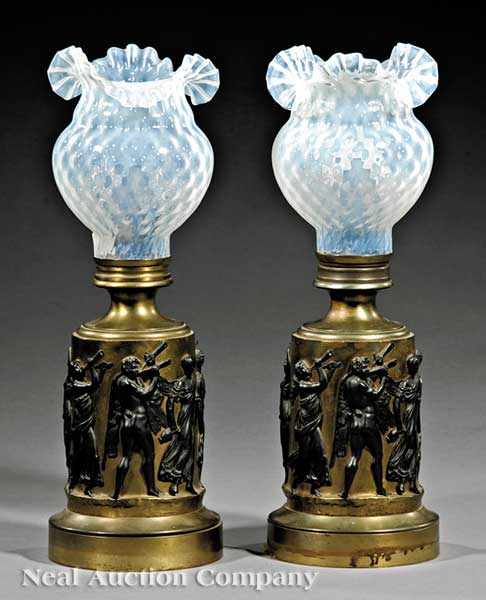 Appraisal: A Pair of Antique French Gilt and Patinated Carcel Lamps