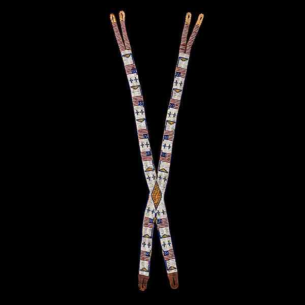 Appraisal: Sioux Boy's Beaded Hide Suspenders with American Flags sinew-sewn and