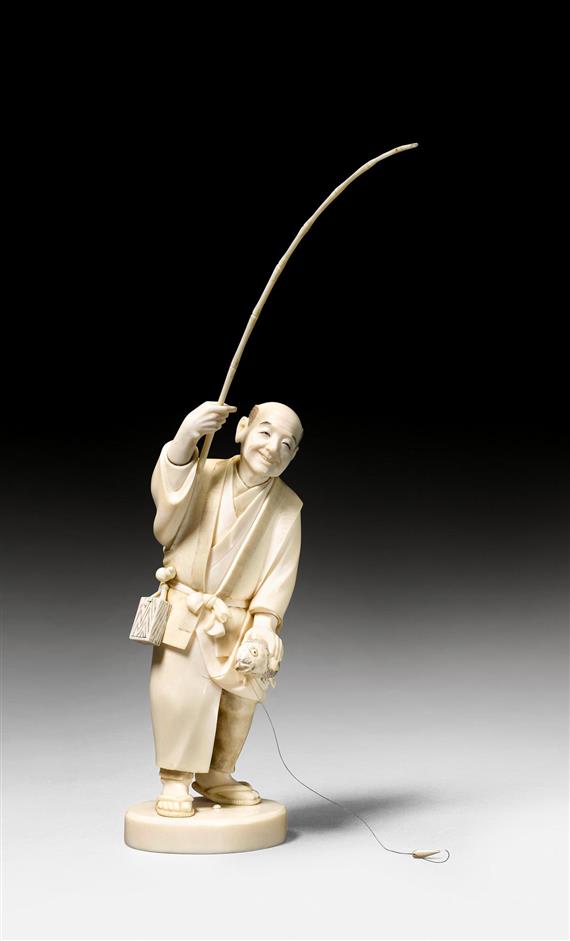 Appraisal: OKIMONO OF A FISHERMAN Japan Meiji period H cm Ivory