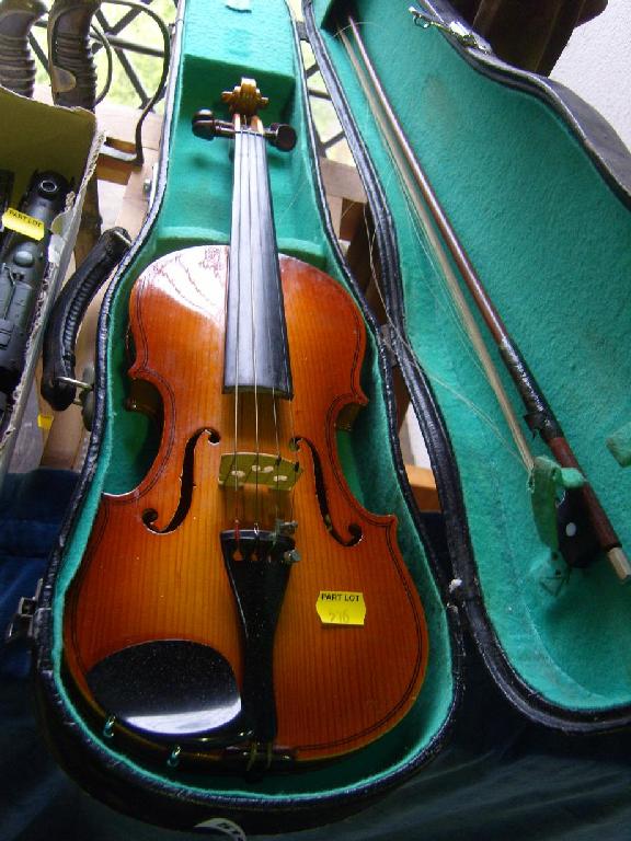 Appraisal: A cased violin with label to interior Lark together with