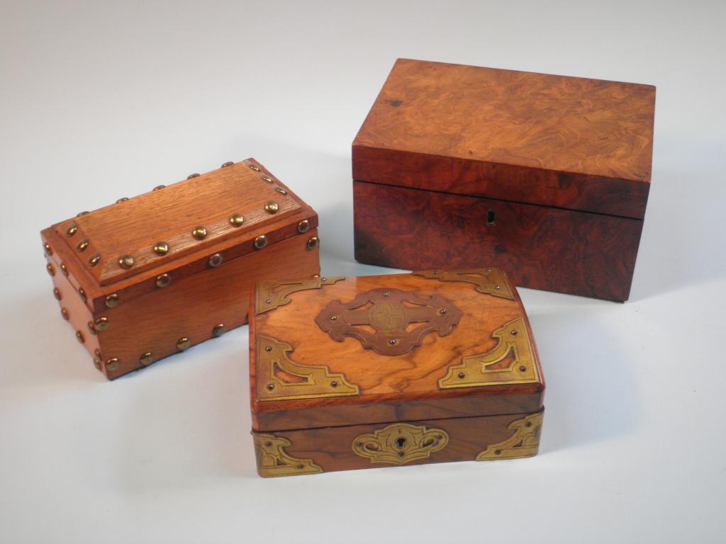 Appraisal: A Victorian burr walnut stationery box a domed box with