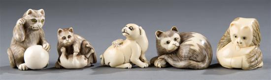 Appraisal: Group of carved ivory bone dog and cat netsukes th