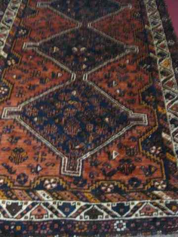 Appraisal: Shiraz Persian Handmade Rug triple medallion with dark blue on