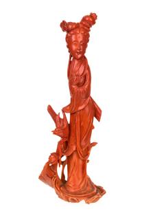 Appraisal: A CHINESE CARVED RED CORAL FIGURE OF A GUANYIN the