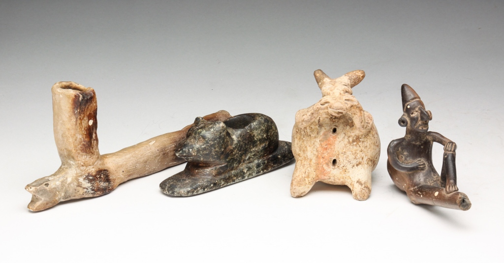 Appraisal: Two Native American pipes One animal figure l and one