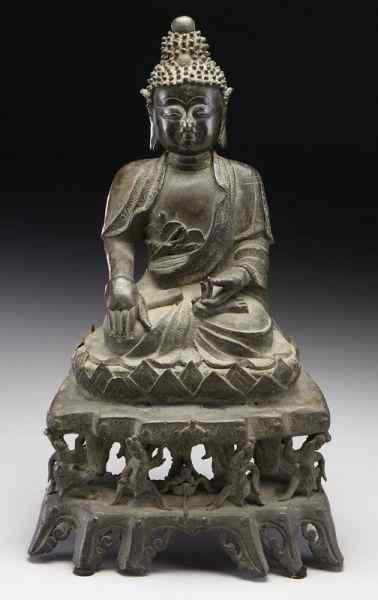 Appraisal: Chinese Ming bronze Buddha his hands inBuddhist mudra with five