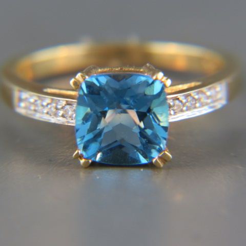 Appraisal: Blue Topaz Diamond Ring rich London blue gems with diamonds