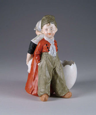 Appraisal: - DUTCH BOY GIRL FIGURINE NEXT TO EGG A well