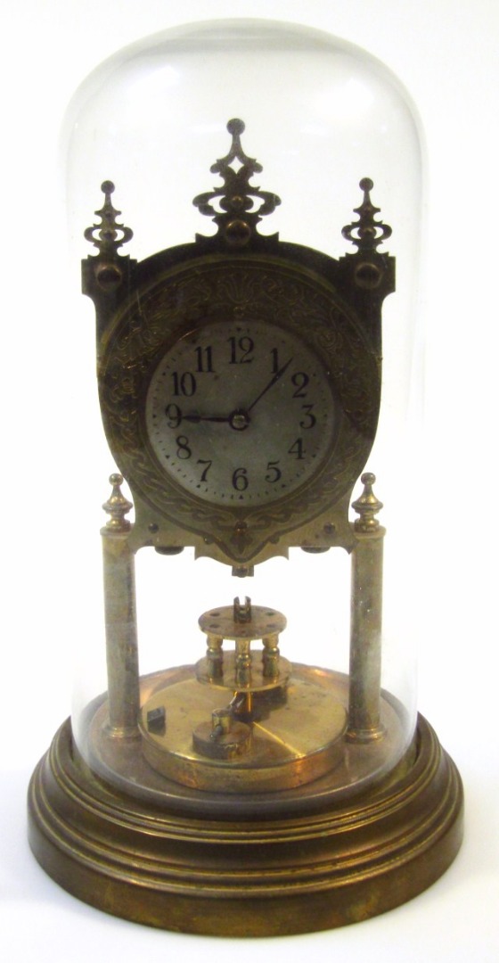 Appraisal: A thC brass anniversary skeleton style clock with cm dia