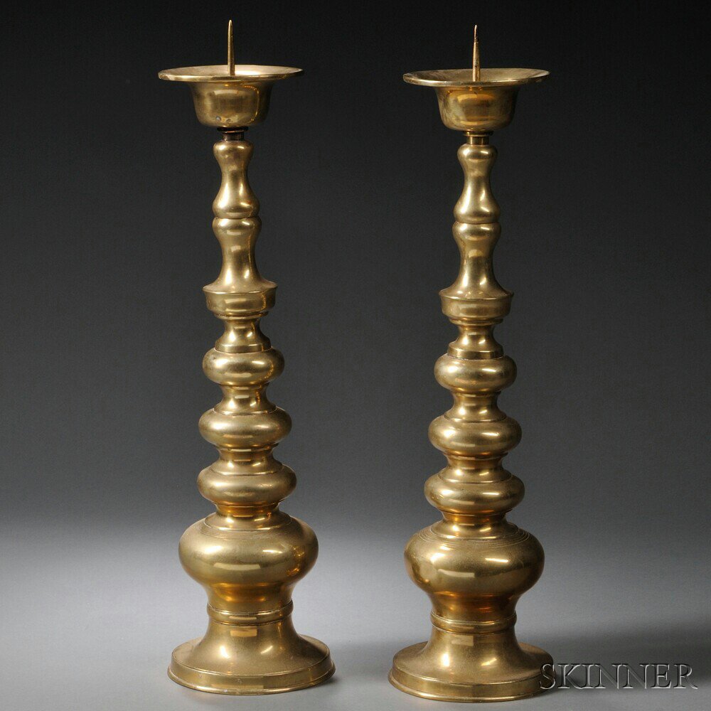 Appraisal: Pair of Brass Candle Holders Asia with knopped balustroid stems