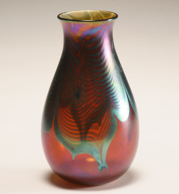 Appraisal: Correia amber studio glass vase with blue iridescent feather pulls