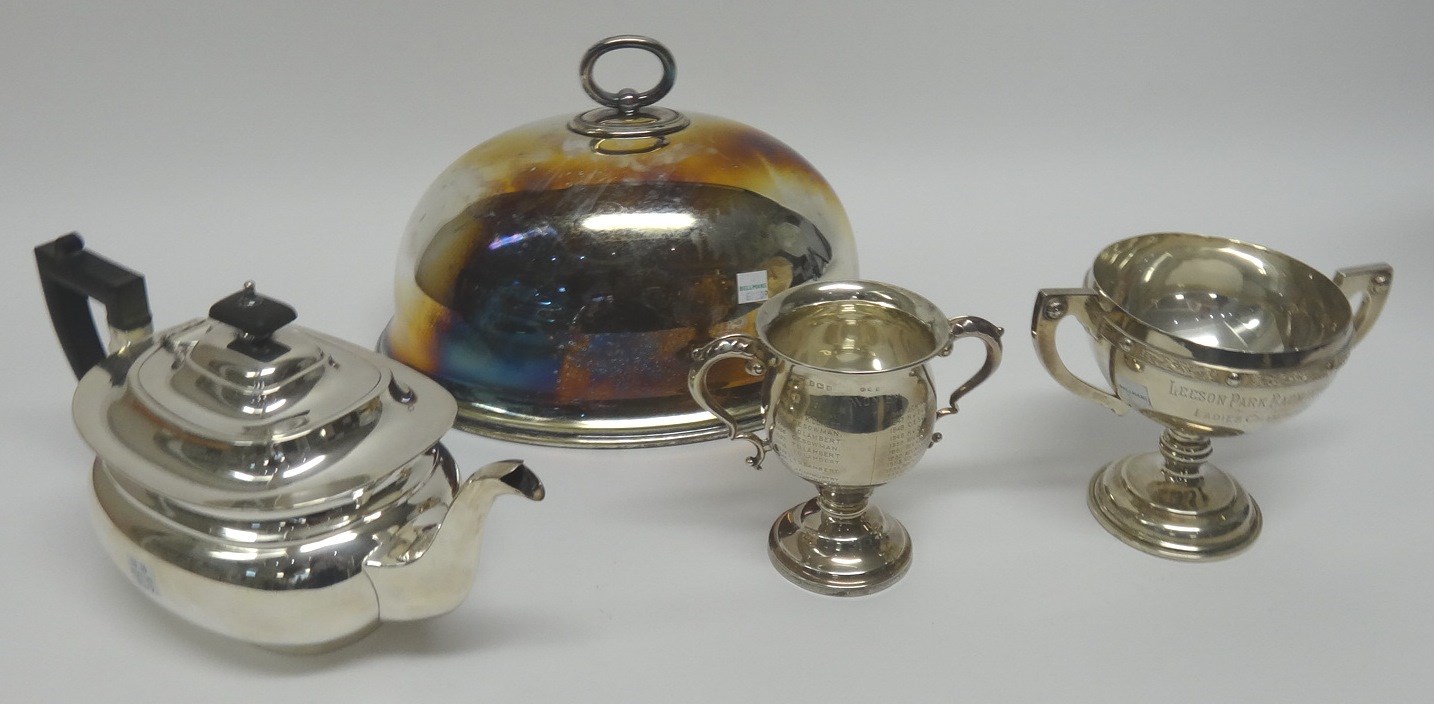 Appraisal: A silver twin handled trophy cup presentation inscribed and decorated