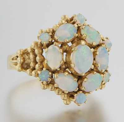 Appraisal: A Ladies' White Opal Cluster Ring k yellow gold ring